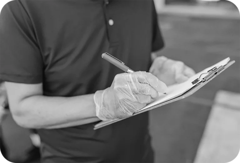 zero waste consultant taking notes on a clipboard